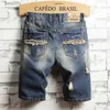 Calças de brim masculinas 2023 verão novos homens vintage rasgado calças curtas streetwear buraco magro denim shorts marca roupas tamanho 28-30 31 32 33 34 36 38l231208