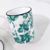 Designer mokken Hoge uitstraling Vlinderdeksel Bone China Waterbeker Melk Koffiekopje Keramische mok met deksel Handgreep Groene geschenkdoos Verpakking
