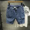 Jeans voor heren 2023 Lente en zomer nieuwe jeansmode Herenjeans Shorts Fashion Wash Hole Patch Slim Fit Elastic Capri herenkledingL231209