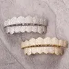 Düğün Mücevher Setleri Avrupa ve Amerika Birleşik Devletleri Gerçek Altın Kaplamalı Mikro Kalan Zirkon Tarafları Hip-Hop Hipster Büyük Altın Diş Takıları 231207 Satıyor