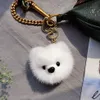 Carino vera pelliccia genuina cucciolo di cane giocattolo pompon borsa con ciondolo portachiavi ciondolo giocattolo per bambini Gift224s