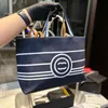 Borsa a tracolla da spiaggia di design da donna di lusso a righe blu scuro Borsa a tracolla in denim da donna di marca francese di moda Borsa a tracolla in denim con doppia lettera di alta qualità Borse per la spesa da donna