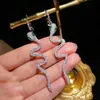 Fascino Moda Orecchini lunghi a forma di serpente INS Occhi verdi Serpente Nappe Orecchini Pendenti per orecchie Gioielli 231208