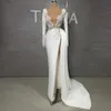 Atemberaubende Scheide Perlen Brautkleider Spitzenseite Split Brautkleider Illusion Deep V Ausschnitt Satin Langarmes Vestido de Novia 415