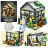 Blocchi City Street View LED Creativo Coffee Shop House Negozio di fiori Building Block Architettura Mattoni luminosi Set Giocattoli per bambini Regali per ragazze R231208