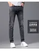 Jeans masculinos designer jeans FF luxo high-end europeu elástico magro homens primavera e verão marca de moda fina perfuração quente pequena perna calças compridas ELZL