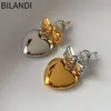 Charme Bilandi 925 Argent Aiguille Asymétrique Lisse En Métal Bowknot Coeur Boucles D'oreilles Pour Les Femmes Bijoux Sens Senior Doux Conception Coréenne 231208