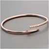 Bangle New LuxuryDesigner Pulseira M Thinner Nail Moda Uni Cuff Casal Ouro Titânio Aço Jóias Dia dos Namorados Drop Delivery Bra Dhqzd