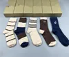 Top vente hommes femmes chaussettes de luxe bas de laine de haute qualité rues seniors chaussettes de genou confortables Designer i11