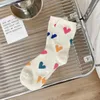 Chaussettes pour femmes, couleur noir et blanc, ligne épaisse, creuse, réduction de l'âge, mignonnes, filet rouge, tendance, pur coton