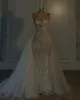 Luksusowe sukienki ślubne syreny krzyżowe kryształowe perły sukienki ślubne zamiatanie szaty de mariee suknie ślubne
