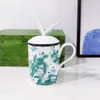 Designer mokken Hoge uitstraling Vlinderdeksel Bone China Waterbeker Melk Koffiekopje Keramische mok met deksel Handgreep Groene geschenkdoos Verpakking