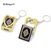 Nouveau coeur doré en forme de Mini version arabe livre du Coran porte-clés pendentif les écritures du Coran porte-clés cadeaux musulmans Islam religieux2418