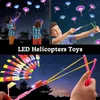 Gants LED élingues lumineuses en plein air Flash Light flèches volantes jouets hélicoptère Slingss catapulte enfants adultes jouet accessoires de fête 231207