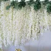 Couronnes de fleurs décoratives 20 pièces en gros rotin de glycine blanche avec feuilles tenture murale fausses fleurs guirlande toile de fond florale vignes décor de fête de mariage 231207