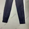 22ss uomo abbigliamento occidentale designer pantaloni da uomo blazer pantaloni autunno cooperazione di lusso pantaloni per il tempo libero casual geometria patchwork stampa pantaloni moda maschile