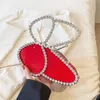 독특한 틈새 디자인 반짝이 가방 여성의 새로운 모조 다이아몬드 핸드백 디자인 핸드 토끼 디너 가방
