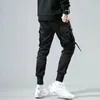 Calças masculinas fitas homens jogger sweatpants calças de carga masculina streetwear hip hop casual preto harem calças masculino harajuku moda calças 231208