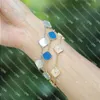 Fashion Classic Woman Armband 4/Four Leaf Clover Charm smycken Armband Elegant 18K Gold Agate Shell Pearl Mor och dotter Par Qcau