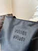 Designer Designer Mu Bag Fourre-tout en cuir Sac fourre-tout Nouvelle épaule Grande capacité Sac Hobo Bon sac à main en cuir