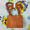 borsa firmata borsa di lusso borsa tote Borse firmate Portafogli da donna da uomo 2 dimensioni Mini media pelle estate viaggio Cross Body pochette moda Borsa a tracolla