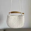 Sardines Bag BottegassVenetaa Genuine Leather Woven Genuine Leather Bag BottegVentas Woven Bag crowd mini real cowhide metal handlebar half moon single shou