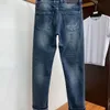 Designer Mäns tryckt broderade bokstäver Solid färg vintage tvätt jeans Löst stretch rak tvätt slitage resistenta övre raden lapp casual byxor