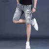 Męskie dżinsy Summer Projektant mężczyzn rozerwany w trudnej sytuacji z rozbitymi patchwork krótkie dżinsy proste krój dżinsowy chłopak designerski szorty JeanSl231208
