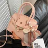 Großhandel Top Original Tragetaschen Online-Shop Kleine Tasche Damen 2024 neue rosa hochwertige Körperstruktur Handtasche mit echtem Logo Pan