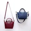 Petit % 90 Spring Store Portefeuille de luxe Clearance Messenger Sacs en gros 2024 Designer Borsa Fourre-tout Femmes Sac Épaissi Dumplings Sacs à main Zipper