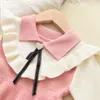 Flickaklänningar Girls 'Autumn Winter Dress Children's Sweater Korean version Fake Two-Piece Color Matching Cute Doll Top Bow Style Style