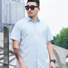 Chemises habillées pour hommes 2023 Mode d'été à manches courtes Chemise ample Couleur unie Blanc Mâle Business Blouses décontractées I163