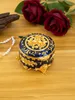 Storage Boxes Metal creative European vintage jewelry gold-plated hand-painted box small high-end rose jewelry storage box cotton exchange box Val 231208