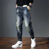 Mäns jeans herrar jeans harem byxor modefickor Desinger Löst fit baggy moto jeans män sträcker retro streetwear avslappnade avsmalnande jeans 231207