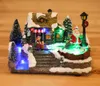 Musik Glow Christmas Village House Scene 1 rullande figurer med LED -ljus och musikbatteri som drivs och USB4902319