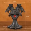 Portacandele Statuine in resina Candeliere Halloween Drago medievale Altare Statua Scultura Supporto Supporto 2 pezzi Candelieri Decorazioni per la casa 231208