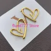 Pendientes de lujo con forma de corazón Huggie para mujer, aretes simples con forma de amor, Clip para la oreja, joyería