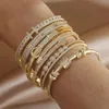 Braccialetti con ciondoli lettera classica di lusso con zirconi per le donne Gioielli di marca di moda elegante braccialetto con serpente placcato oro 14K 231208