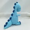 Bambole di peluche in cotone all'uncinetto Baby peluche Dinosaur Doll kawaii Dinosauro lavorato a maglia Giocattoli di peluche nati Dormire Cuddle Doll Giocattoli educativi per bambini 231208