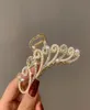 2021 Nowy elegancki złoty, pusty geometryczny metalowy pazur klipsy do włosów dla kobiet opaski na włosy Krab Krab Akcesoria 9417222