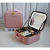 Cosmetic Bags Cases Smart LED Makeup bag For Women With Mirror Compartments Waterproof PU Leather Travel Case 231208