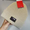 Bonnet de luxe de créateur de mode d'hiver pour hommes et femmes, chapeau tricoté en laine chaude, unisexe du Canada