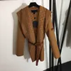 Casaco de lã feminino designer casaco de manga longa com capuz jaqueta de lã blusão cinto design de cintura forro logotipo quente casaco dez 08 novo