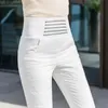 Damskie dżinsy zimowe ciepłe kaczki w dół spodnie koreańskie mody w paski biały zagęszcza spodnie wąsła wysoka bawełniana bawełniana odcinek 231208
