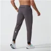 Lu Yoga Pants Men Womens LL Mens Jogger Long Sport Outfitクイックドライドローストリングジムポケットスウェットパンツズボンカジュアルエラスティックウエストフィットネス