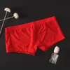 Boxer da uomo sexy da uomo semitrasparenti Hombre Cuecas mutande gay di seta di ghiaccio biancheria intima senza cuciture boxer pantaloncini Slip Homme