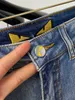 Kvinnors jeansdesigner Jeans 23 Vår/sommar New Men's Korean Edition Elastic Slim Fit Small Feet High Europe European Blue Monster Long Pants 53zu