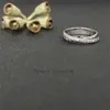 Anillo de bodas de lujo Diseñador de marca de moda estadounidense Joyería x Intersección con incrustaciones de diamantes Plata esterlina 925 para mujeres Anillos de regalo