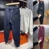 Moda Monclair Sportswear Leggings Mens Outono e Inverno Pelúcia Engrossada Calça Casual Juventude Slim Fit Moda