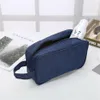 Femmes Men Sac cosmétique Fashion Unisexe Zipper Toitrage Sac pour femmes Travel Portable Organisateur Makeup Wash Pouche Handbag243i